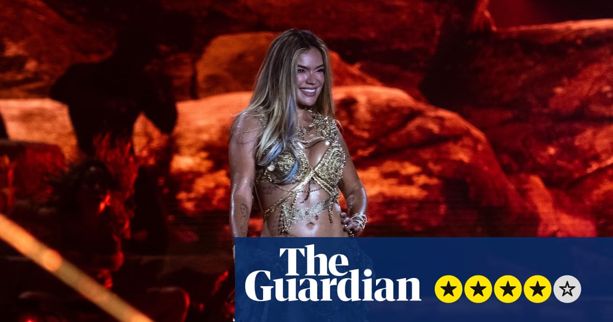 Karol G review – Colombian chart-topper brings pan-Latin camp and fireworks to New Jersey