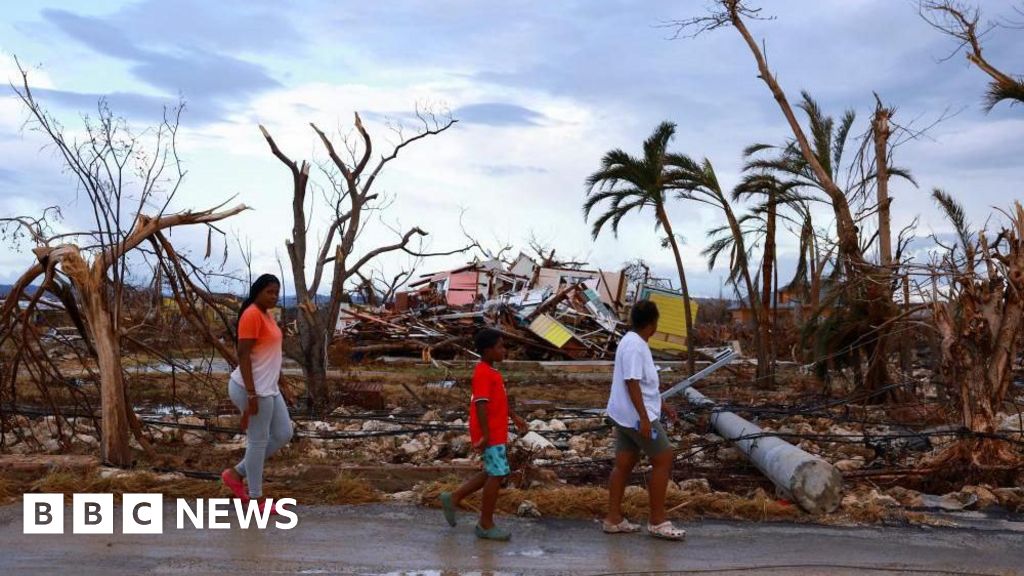 How do hurricanes and typhoons form and is climate change making them stronger?