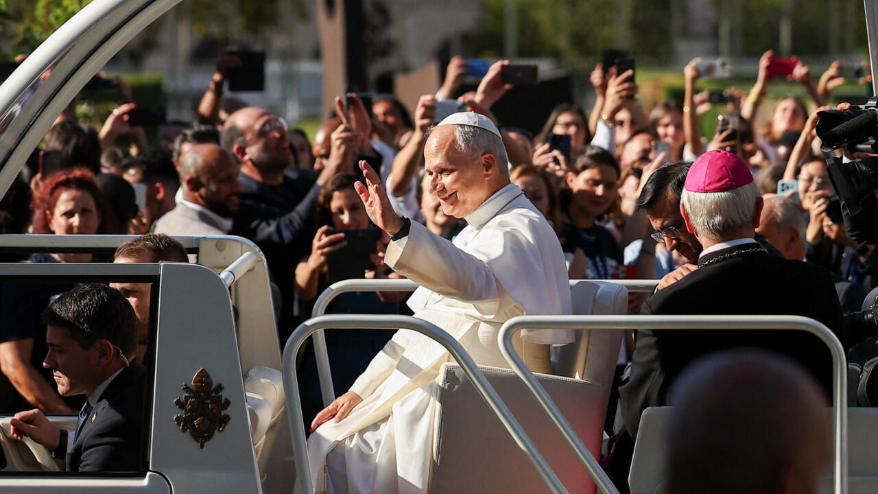 Pope Leo XIV rides through Paris in the popemobile to Notre-Dame